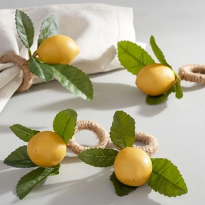 Artificial lemon napkin ring with jute rope and green leaves for table decoration