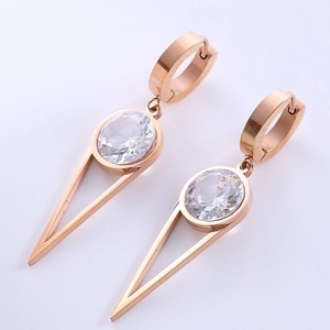Detail view of rose gold geometric triangle earrings with sparkling round zircon stone