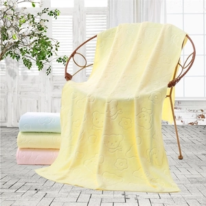 Microfiber bath towels with embossed bear patterns in four soft pastel colors