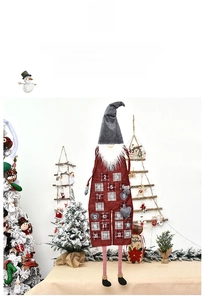 Detail showing Nordic Christmas gnome advent calendar with pockets numbered from 1 to 24