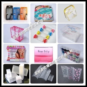 Macro view of clear PVC zipper bags and custom printed plastic stationery packaging boxes