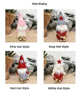 Detail view of four colorful skiing Christmas gnomes in pink, gray, red, and white felt fabric