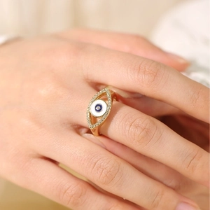 Golden evil eye open ring for women with blue enamel and sparkling crystal accents