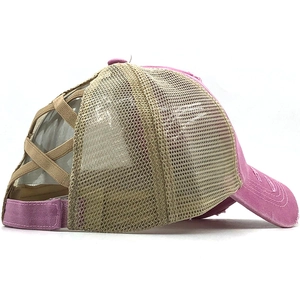 Detail of pink and beige mesh trucker hat with triple cross elastic bands for high ponytails