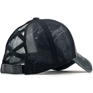 Detail of cross elastic ponytail band and mesh back on washed vintage baseball cap