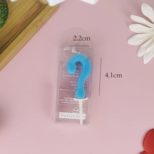 Blue question mark birthday candle with 2.2cm width and 4.1cm height dimensions