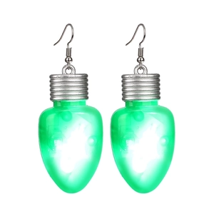 Detailed view of green LED Christmas light bulb earrings with silver hooks on white background