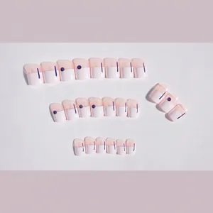 Blue and white dotted graffiti press-on nails with minimalist geometric line patterns