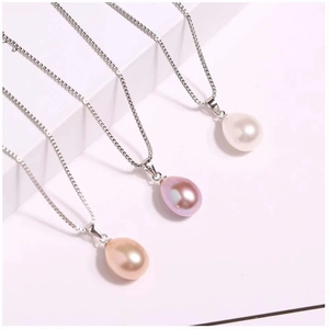 Three teardrop pearl pendants in white pink and champagne on silver S925 necklaces