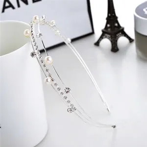 Elegant multi-layer silver headband with white faux pearls and sparkling rhinestones