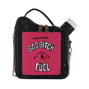 Detailed view of gasoline tank bag featuring sequined embroidery and gold chain strap