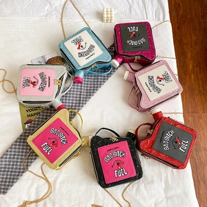 Top view of creative oil drum sequin crossbody bags in seven assorted metallic colors