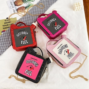 Detail shot of creative oil drum bags with sequins, metal chains and embroidery art