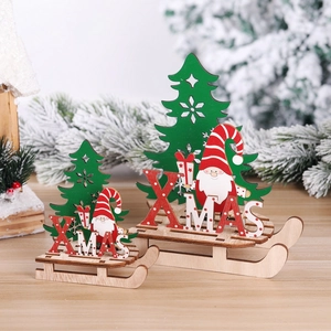 DIY wooden Christmas sleigh table ornament featuring Santa Claus and green trees