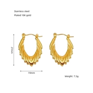 Detail showing dimensions and 18K gold plated stainless steel material of the earrings
