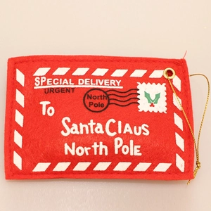 Red felt Christmas envelope ornament with To Santa Claus text and golden hanging string