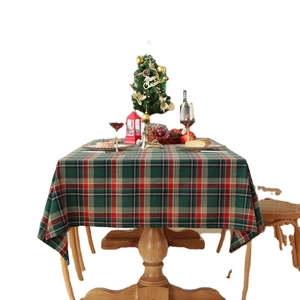 Plaid Christmas tablecloth in red and green festive tartan pattern with tassels