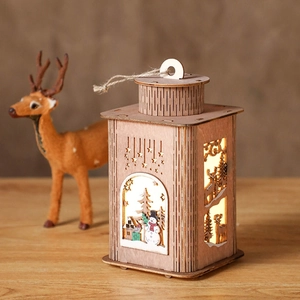 Wooden Christmas lantern decoration with warm LED lights and laser-cut winter scenes