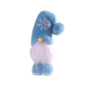 Blue Christmas gnome plush with snowflake pattern and white beard on white background