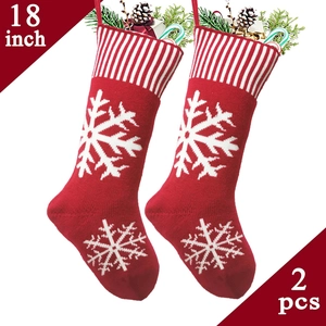 Set of two 18 inch red knitted Christmas stockings with white snowflake patterns