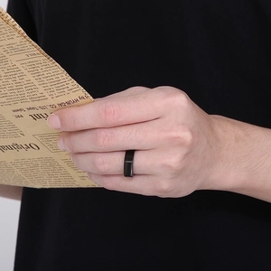 Minimalist black plated stainless steel ring with flat wide surface for men on hand