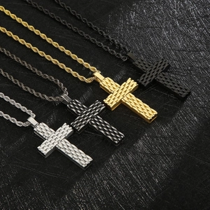 Cross necklaces in gold, silver, and black with textured diamond patterns on twist chains