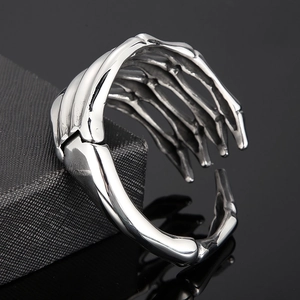 Macro view of vintage silver skull hand bracelet made of durable titanium steel