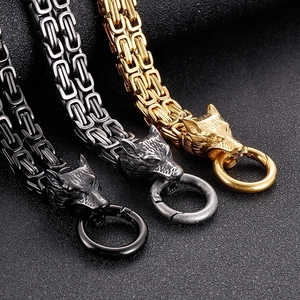 Byzantine chain bracelets for men featuring wolf head clasps in black, silver, and gold steel