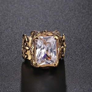 Vintage punk style gold steel ring for men featuring a large rectangular clear crystal