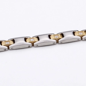 Two-tone gold and silver stainless steel link bracelet with sparkling zircon stones