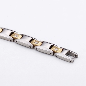 Minimalist two-tone stainless steel magnetic bracelet with sparkling cubic zirconia inlay