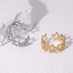 Star-shaped 18K gold and silver stainless steel adjustable rings with beaded edges