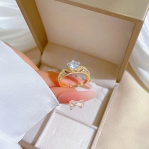 Adjustable gold plated ring with eight hearts and arrows round cut cubic zirconia stone