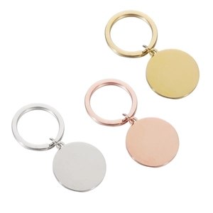 Polished stainless steel round keychains in silver, gold, and rose gold finishes
