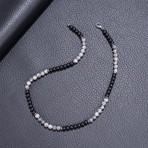6mm natural map stone beaded necklace with matte black beads and silver spacers on leather