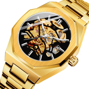 Macro shot of gold octagonal skeleton mechanical watch with black dial and metal strap