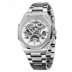 Close-up of silver stainless steel octagonal case and skeleton dial of mechanical watch