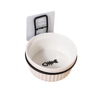 Wall-mounted ceramic pet bowl with fishbone pattern and black metal bracket for cats