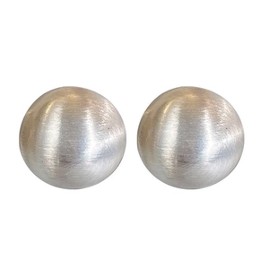 Minimalist silver brushed metal ball stud earrings shown in a clean front view