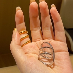 Minimalist multi-layered winding rings in gold and silver finish for women