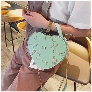 Fashionable mint green heart-shaped crossbody bag with floral embroidery and gold chain