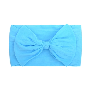 Soft baby nylon headband with large light blue bow and high elastic fabric texture