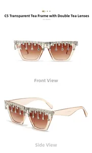 Vues frontale et latérale de lunettes de soleil œil-de-chat de luxe avec glands en strass