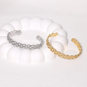 Wide minimalist stainless steel woven geometric open bangles in gold and silver finish