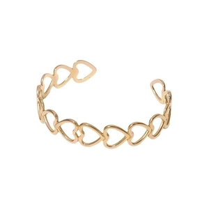 Minimalist gold titanium steel open bangle with hollow heart pattern on white background