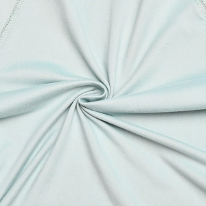 Close-up of light blue elastic fabric texture with professional stitching details