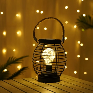 Nordic black iron lantern with warm LED copper wire bulb and hemp rope handle decor