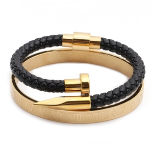 Men's gold Roman numeral bangle and black woven bracelet set in minimalist style