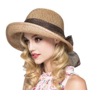 Women's foldable khaki straw sun hat featuring a brown bow ribbon for beach vacation