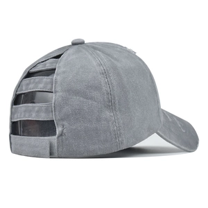 Detail of washed grey baseball cap with ladder-style ponytail opening and velcro closure